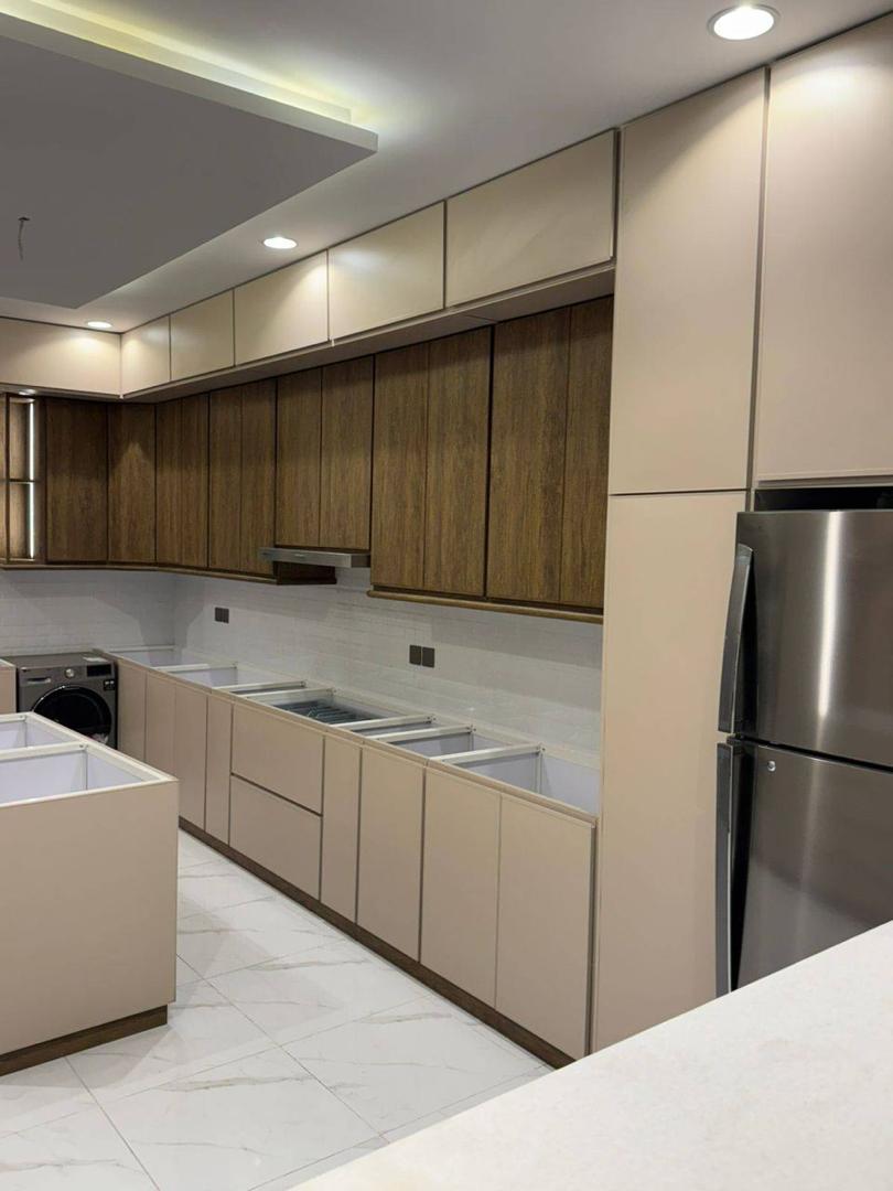 Modern kitchen cabinet layout by Paintboss